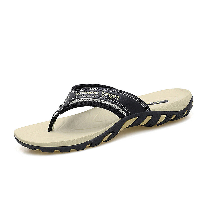 Black and beige sandal with 'Sport' branding on a white background