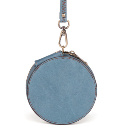 Round blue leather pouch with a strap on a white background