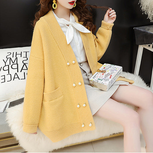 Cartoon female 2019 autumn and winter new Korean version of loose solid color pearl buckle thin knit sweater double buckle outer cassette tide