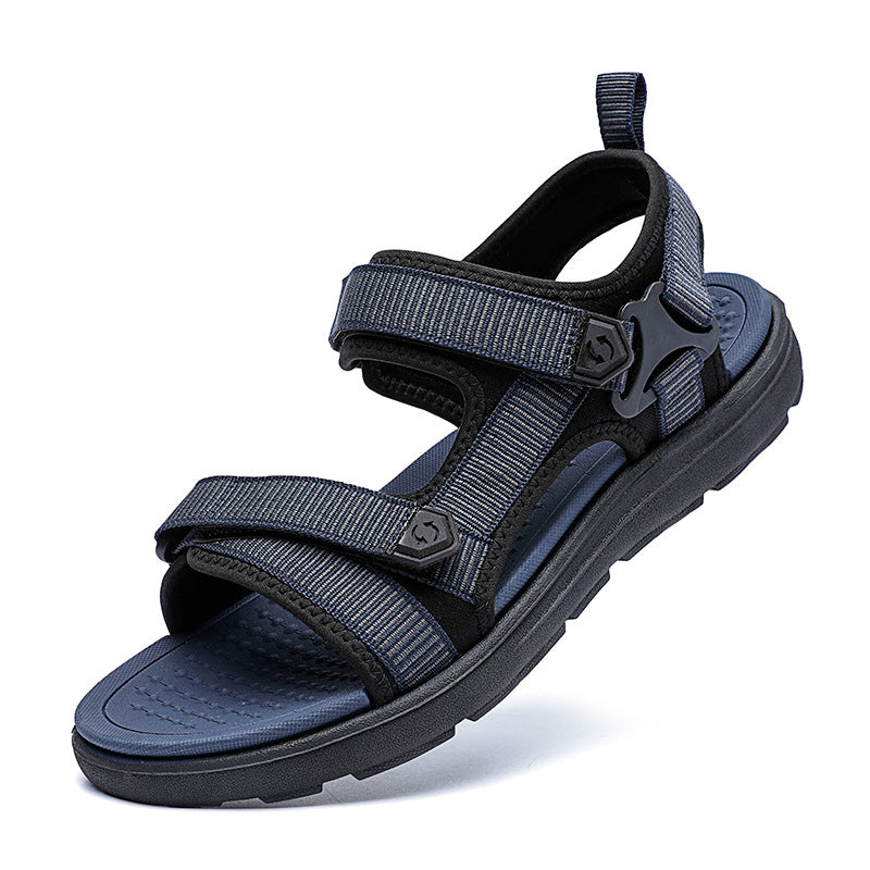 Black and blue sandal with multiple straps on a white background