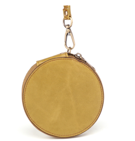 Round yellow leather pouch with a keychain clip on a white background