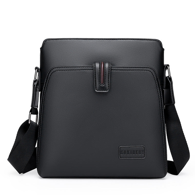 Black leather crossbody bag with a visible brand logo on a white background