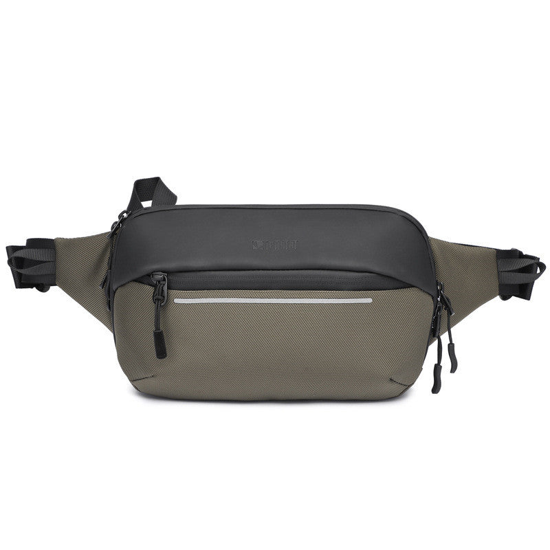 Two-toned waist bag with black top section and olive green bottom section on a white background