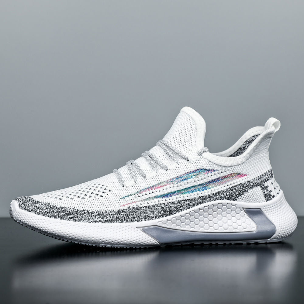White athletic shoe with colorful accents on a gray background