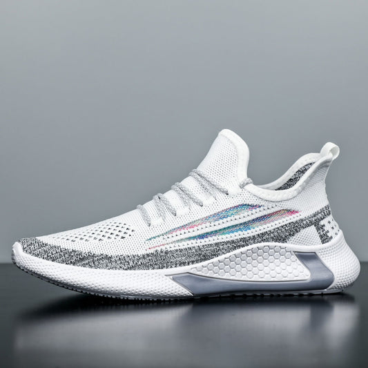 White athletic shoe with colorful accents on a gray background