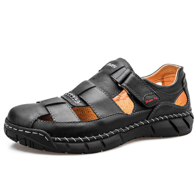 Black sandal with orange accents on a white background