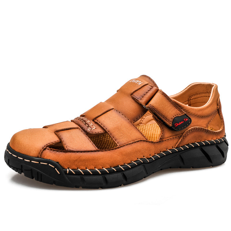 Brown sandal with black sole on a white background