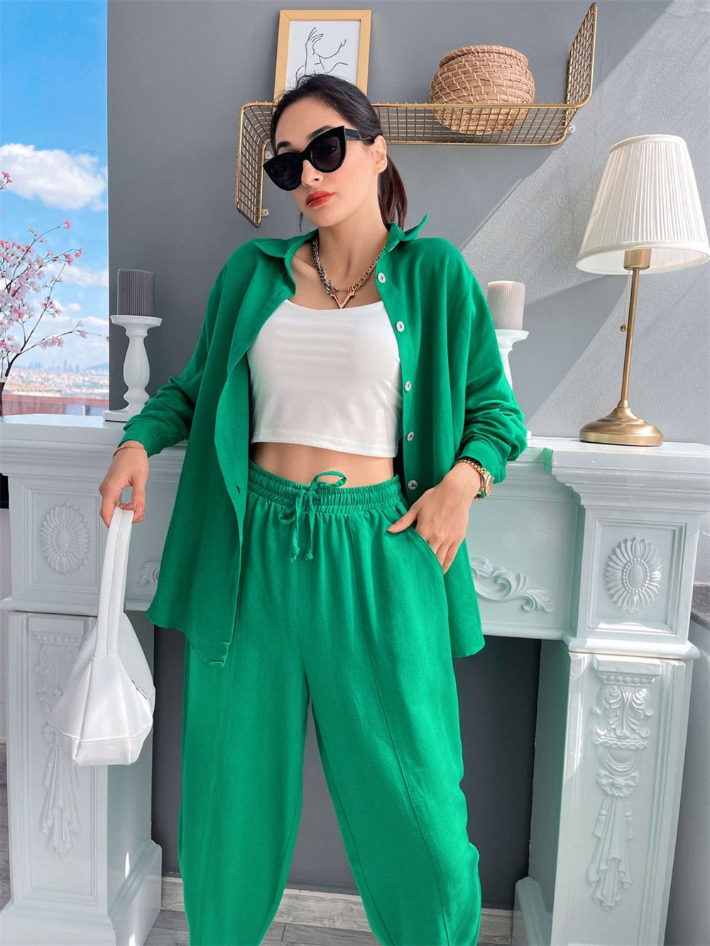 2022 spring new European and American cross-border casual suit solid color lapel long-sleeved shirt top harem pants two-piece set