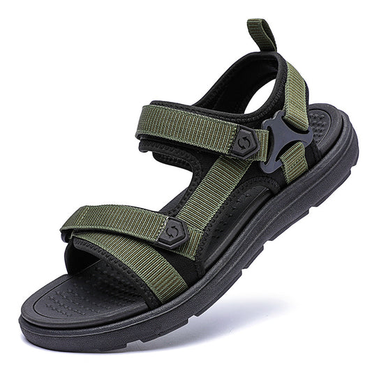 Green and black sandal on a white background