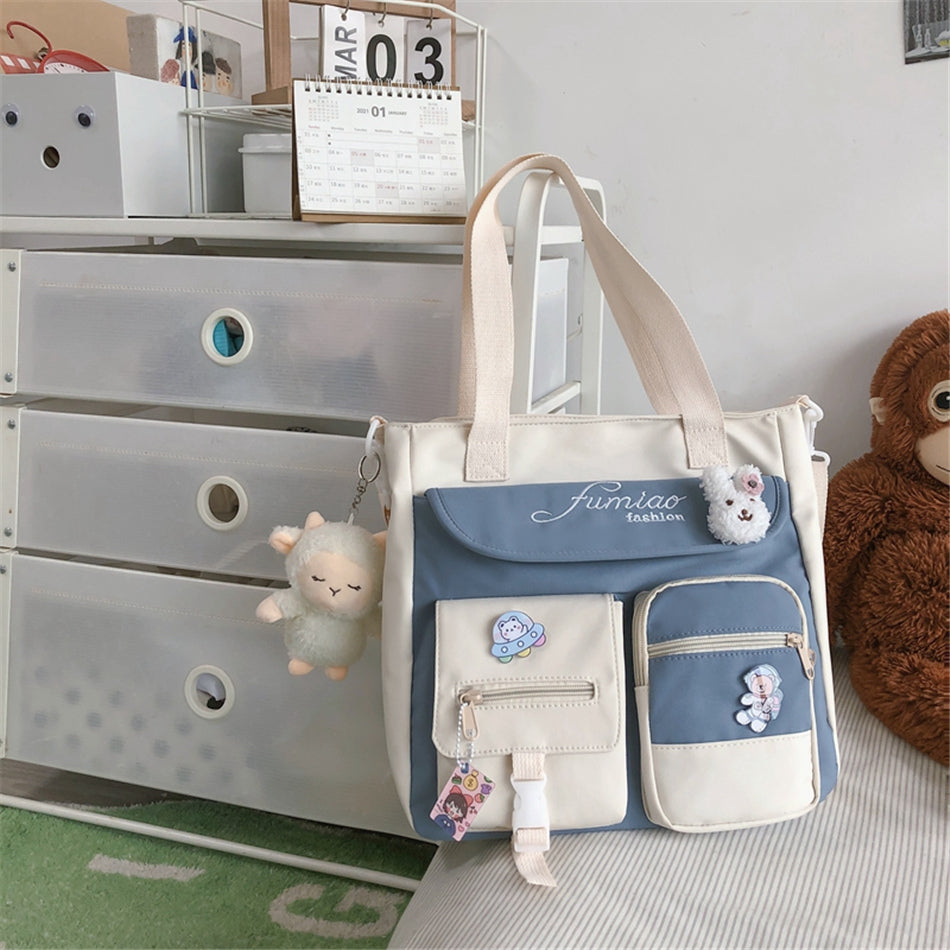 White and blue bag with decorative elements on a dresser