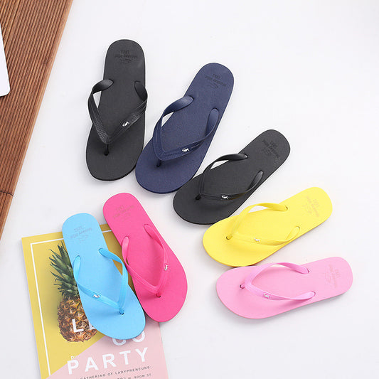 Solid color wild couples flip toile shoes summer human words hairdressing men and women beach shoes women's sandwich shoes