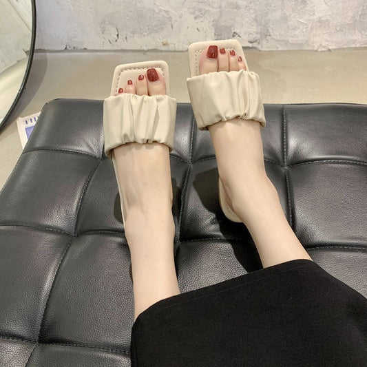 Flat slippers female new summer 2020 Korean version of the fashion pleated cold roll head fairy wind zipper slippers