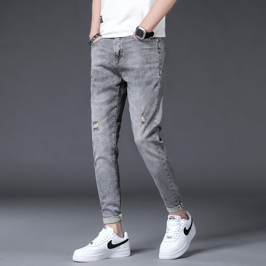 2021 spring and autumn new jeans men's small feet Korean version of the trend men's fashion casual tide stretch trousers