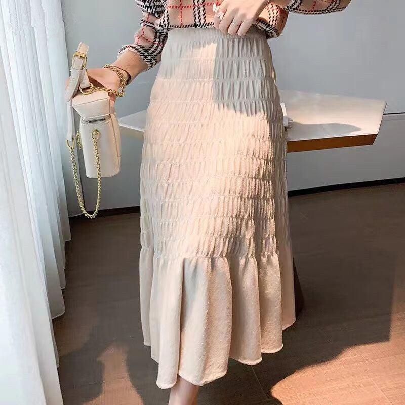 Factory wholesale A word skirt 2021 autumn and winter crumpled solid color fresh sweet knitting long skirt stitching Korean version of the skirt