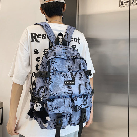 Korean version of the graffiti men's casual shoulder bag large capacity bag male fashion trend high school college students travel backpack